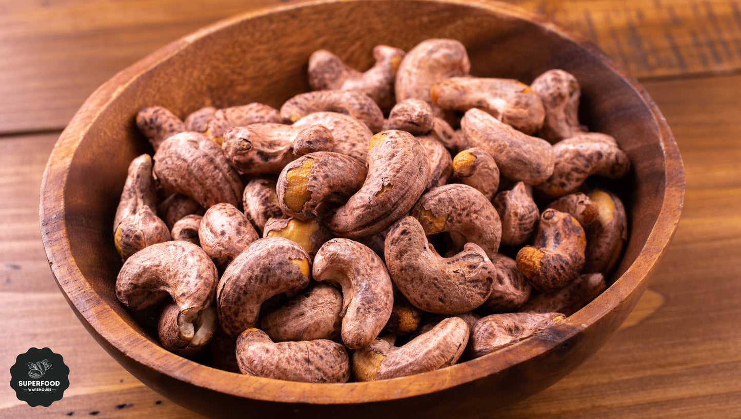 Extra large dry roasted salted cashew nuts with the skin on in a bowl - Superfood Warehouse